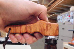 Contoured Wood and Nail Bottle Opener - Image 1